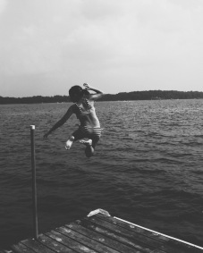 Jumping into the lake on a warm, summer, day.